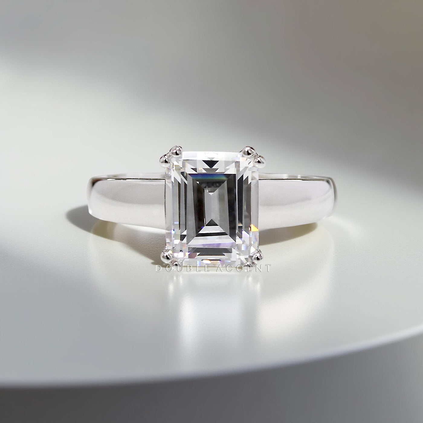 Still Clarity Ring – 4 carat emerald cut solitaire in platinum silver