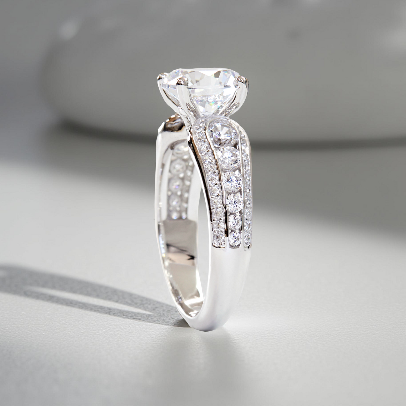 Side view – tapered platinum band and flowing accent design
