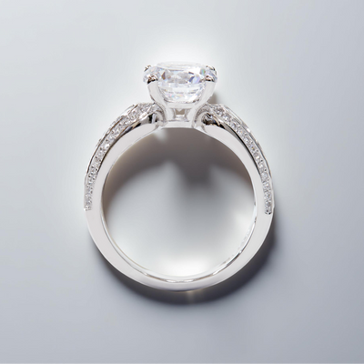 Promise in Progress Ring – 2 carat center stone with graduated channel-set accents