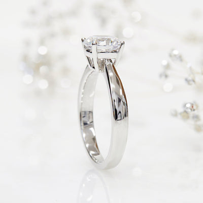Lustrous Tapered Solitaire Ring. 1.2 CT