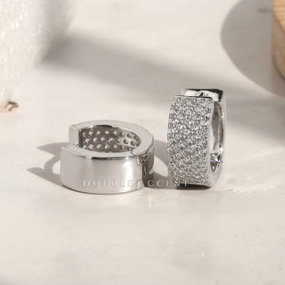 Wide sterling silver pave huggies with secure clasp design
