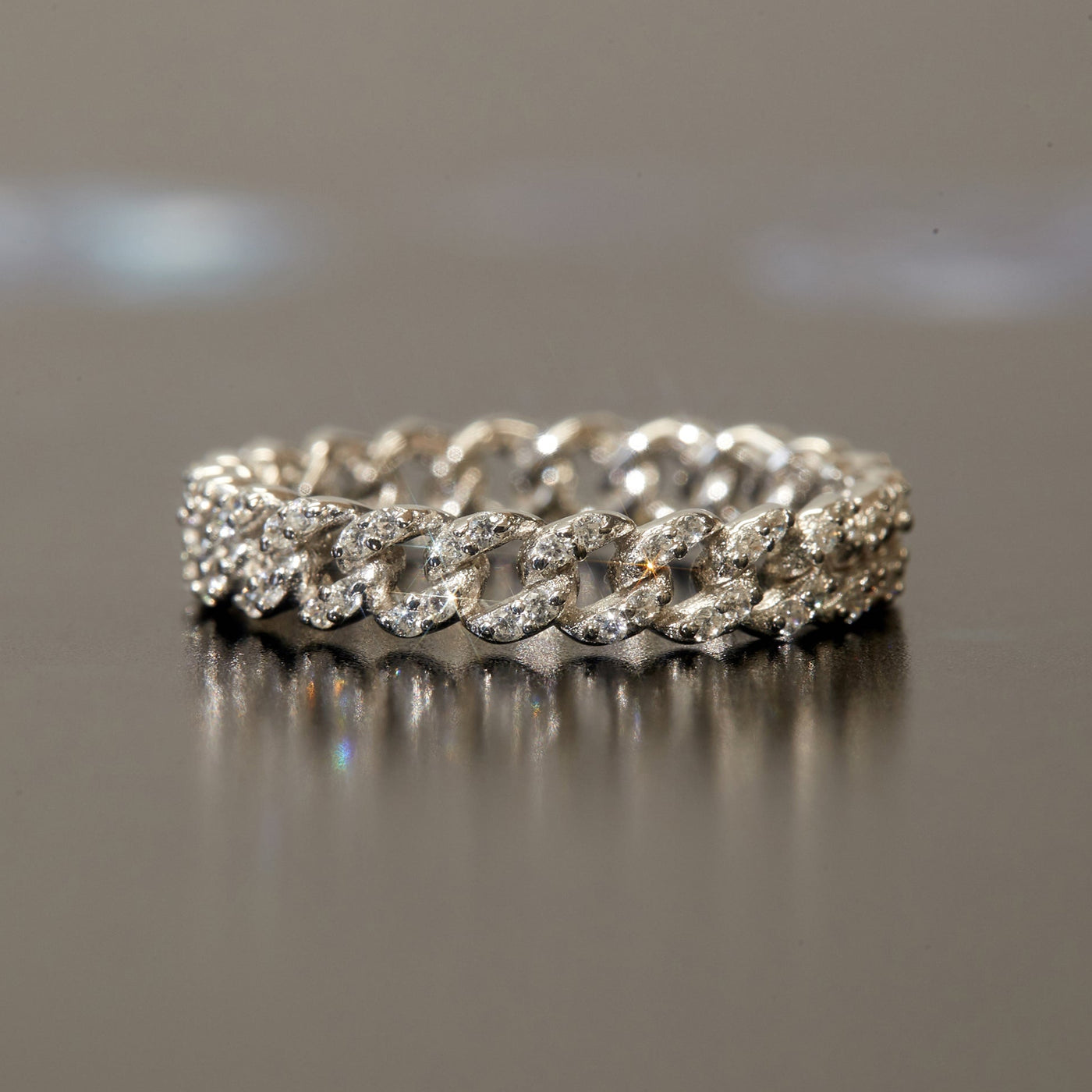 Linked Eternity Ring with pavé CZ in curb chain design, rhodium-plated silver.