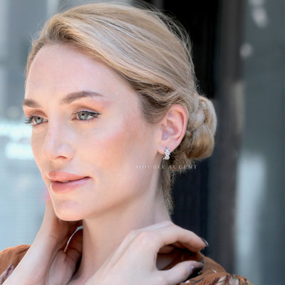 Model wearing Luminous Stack Huggies for everyday styling