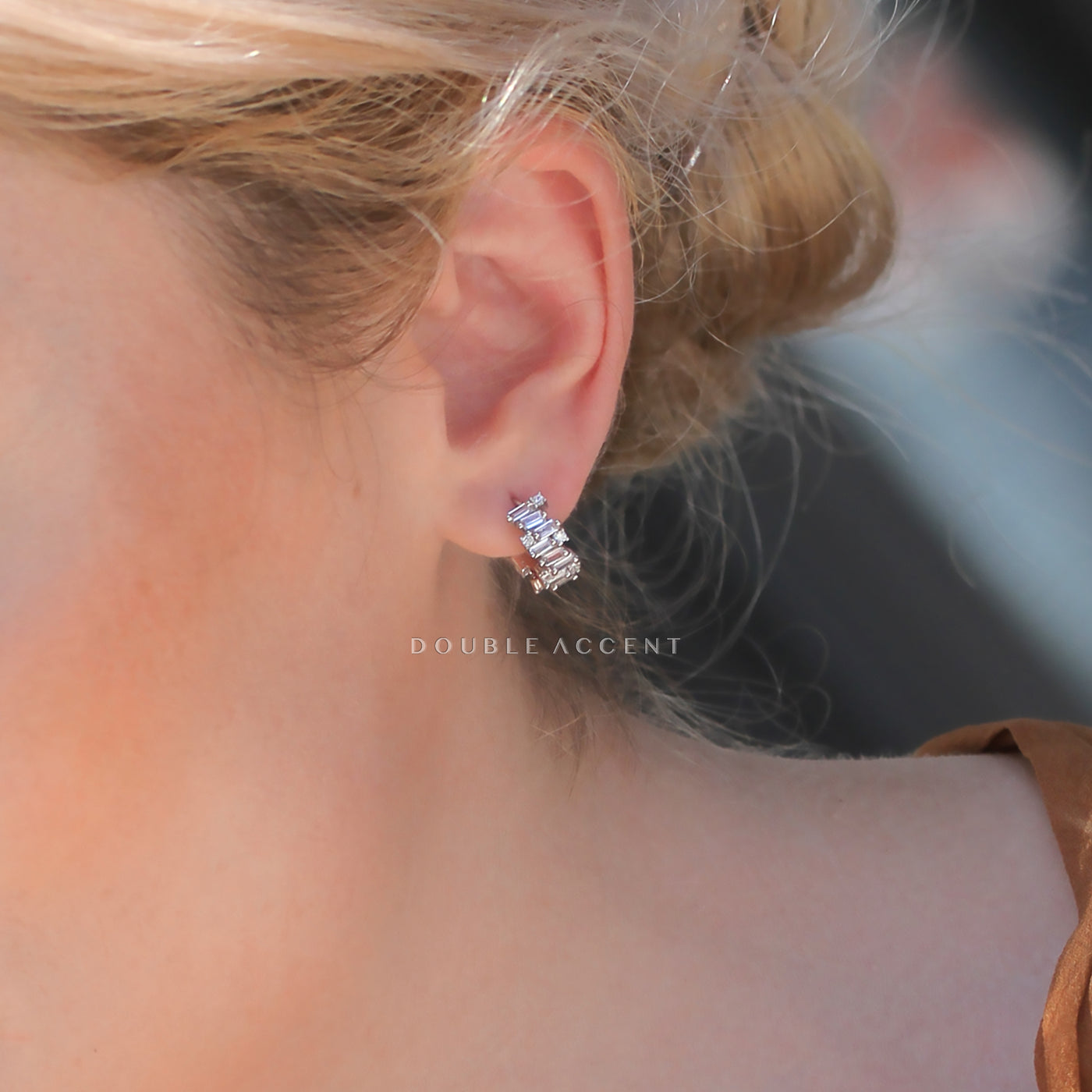 Model wearing Luminous Stack Huggies for everyday styling