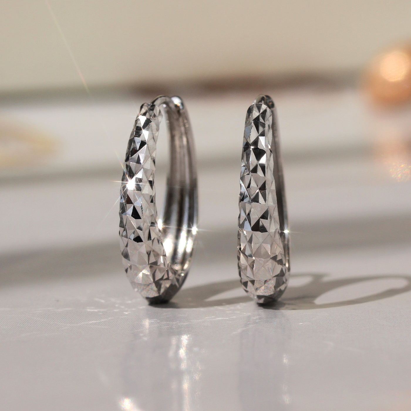 Sparkling Diamond-Cut Oval Hoops