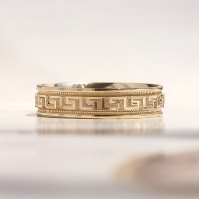 Greek Key Band Set — solid 14K gold wedding bands with continuous engraved eternity pattern