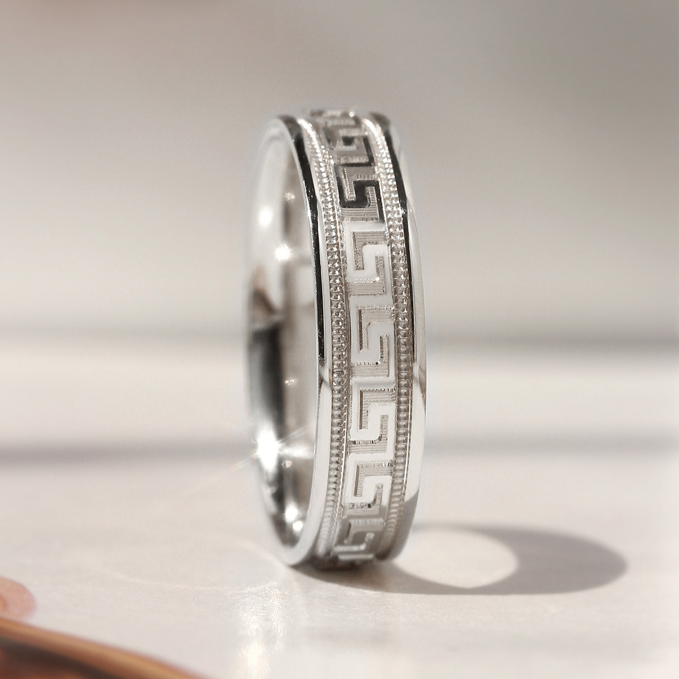 Greek Key Band Set — solid 14K white gold wedding bands with continuous engraved eternity pattern