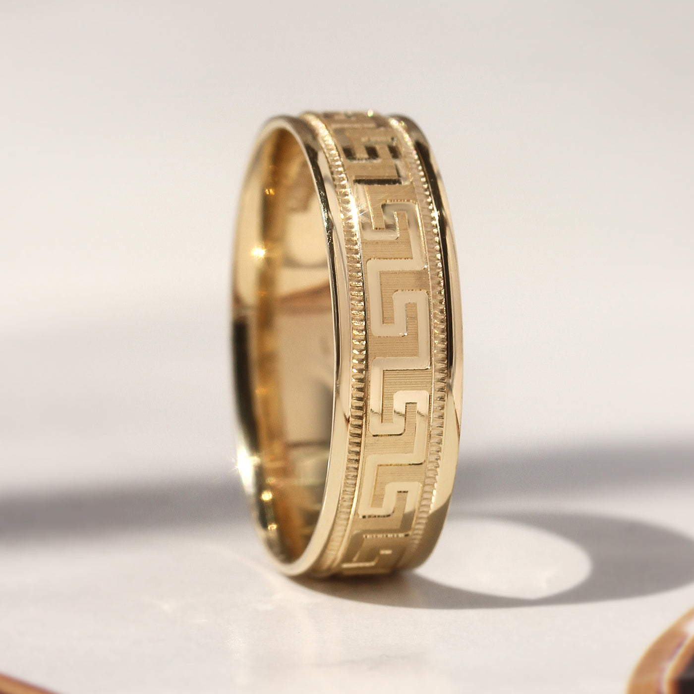 Greek Key Band Set — solid 14K gold wedding bands with continuous engraved eternity pattern