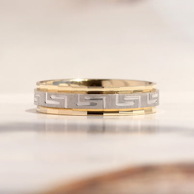 Duality Greek Key Band — two-tone 14K gold wedding ring with carved Greek Key eternity pattern