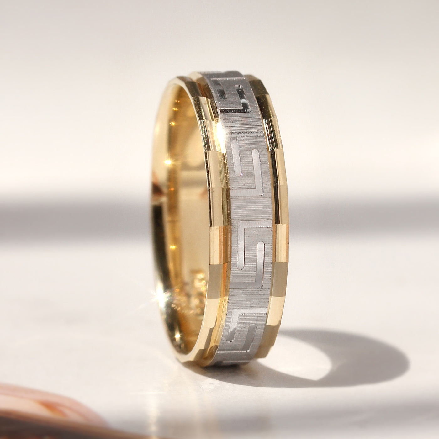 Duality Greek Key Band — two-tone 14K gold wedding ring with carved Greek Key eternity pattern