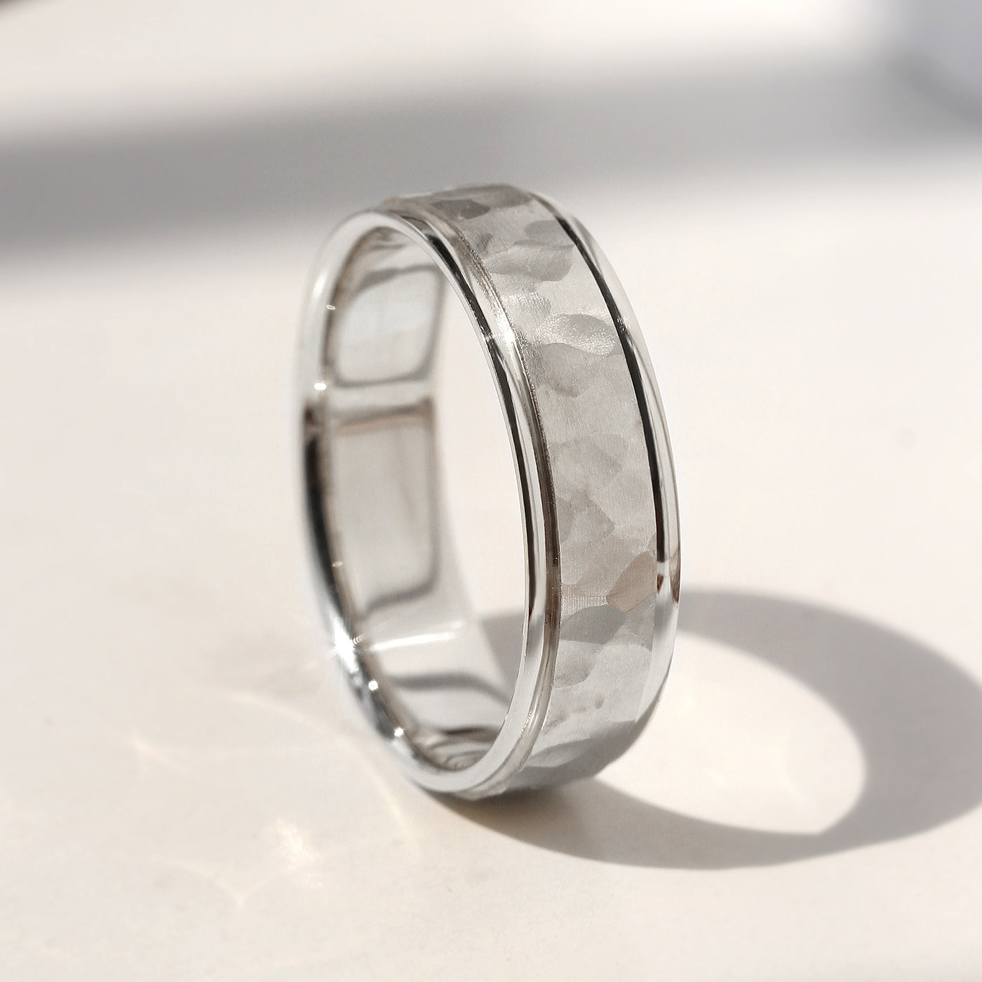 True Hammer Gold Band — hand-textured hammered wedding ring in solid 14K white gold with comfort fit