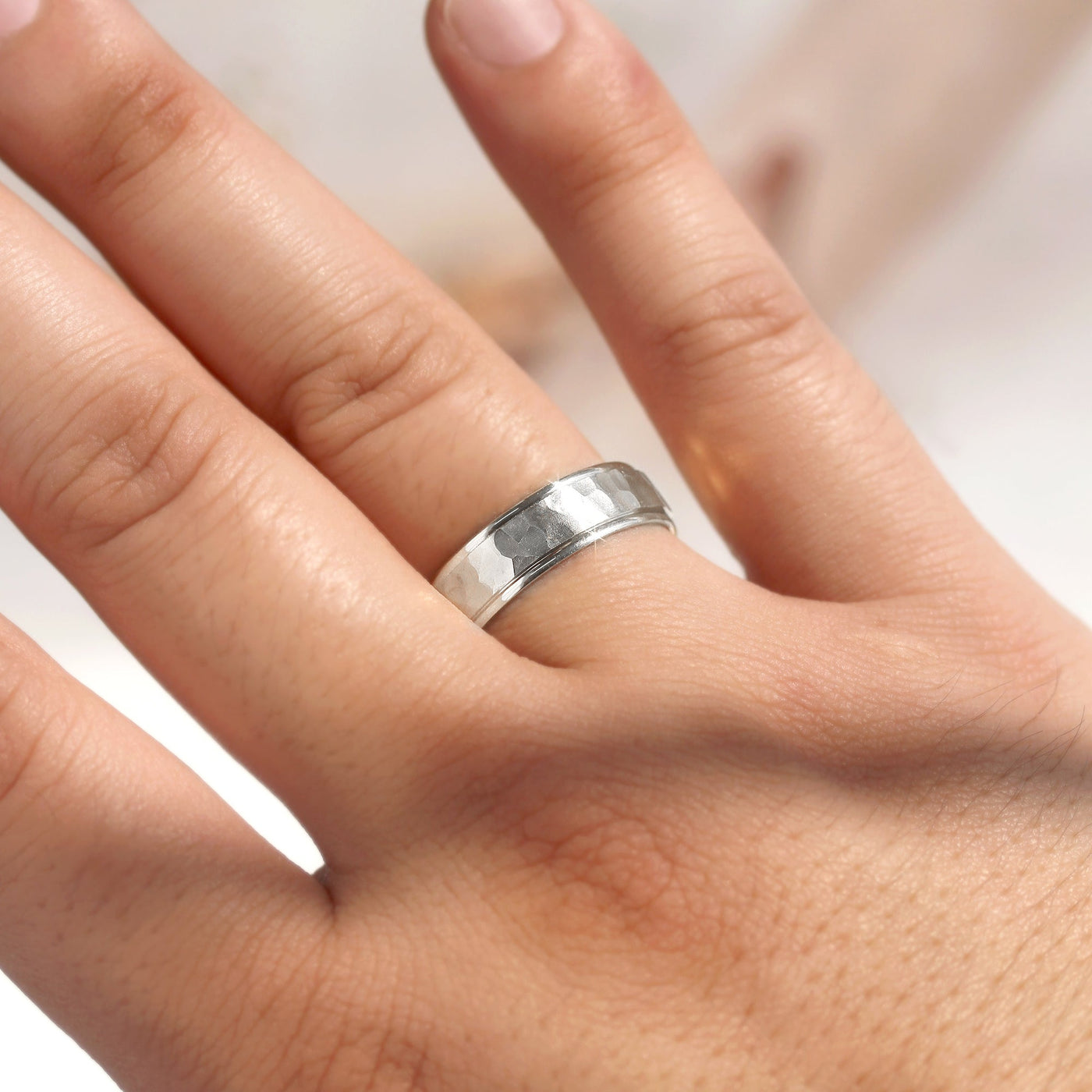 True Hammer Gold Band — hand-textured hammered wedding ring in solid 14K white gold with comfort fit