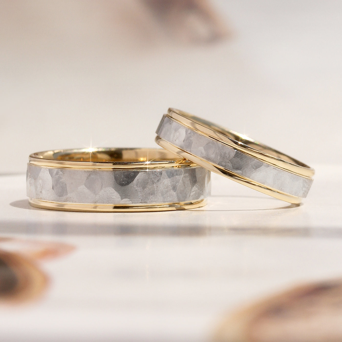 True Hammer Two-Tone Gold Band — 14K white and yellow gold hammered wedding ring with polished edges