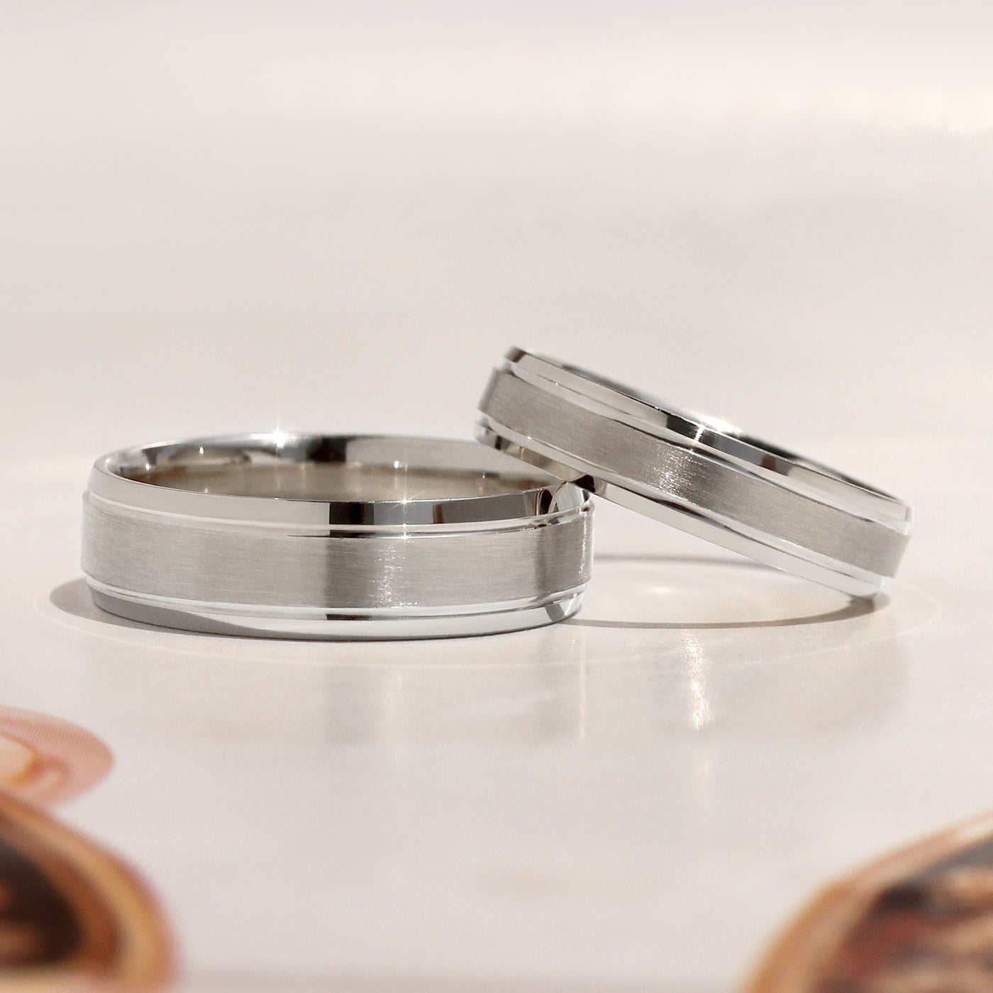 Matching 14K white gold wedding bands featuring a matte center with polished grooved edges – Evermore Band Set by Double Accent