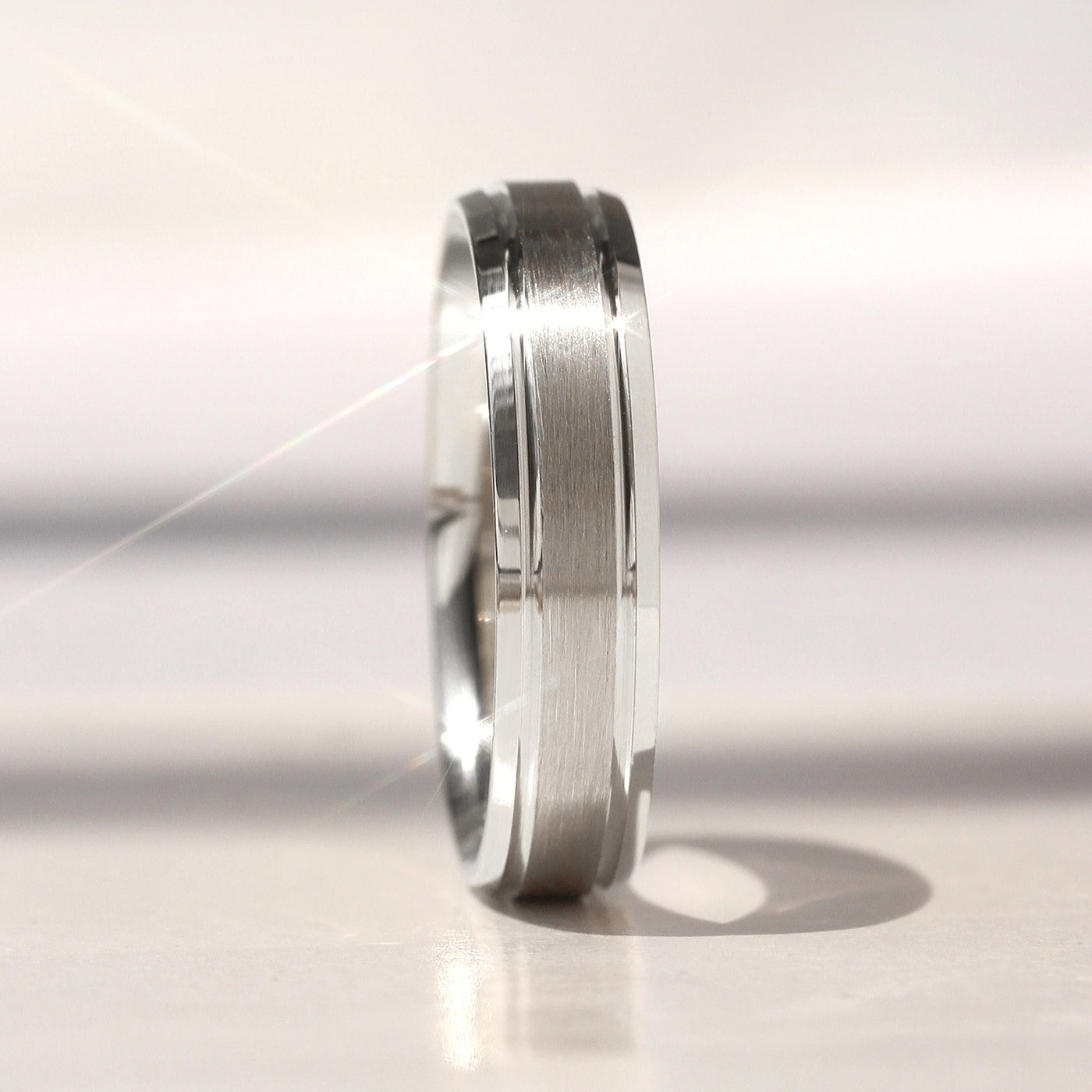 Matching 14K white gold wedding bands featuring a matte center with polished grooved edges – Evermore Band Set by Double Accent