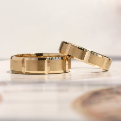 Matching 14K gold wedding bands with matte finish and geometric faceted edges – Reflections Band Set by Double Accent