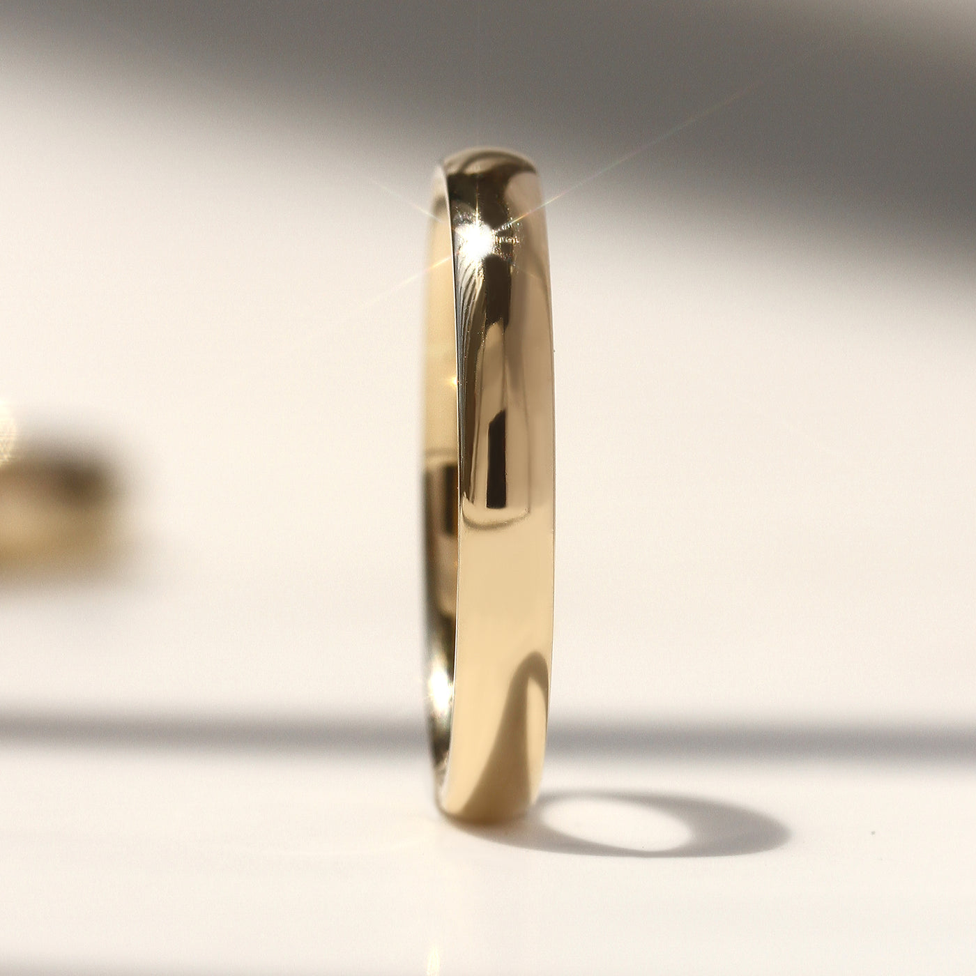 Solid 14K gold and Legacy Dome Band with high-polished finish, available in multiple widths.