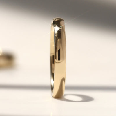 Solid 14K gold and Legacy Dome Band with high-polished finish, available in multiple widths.