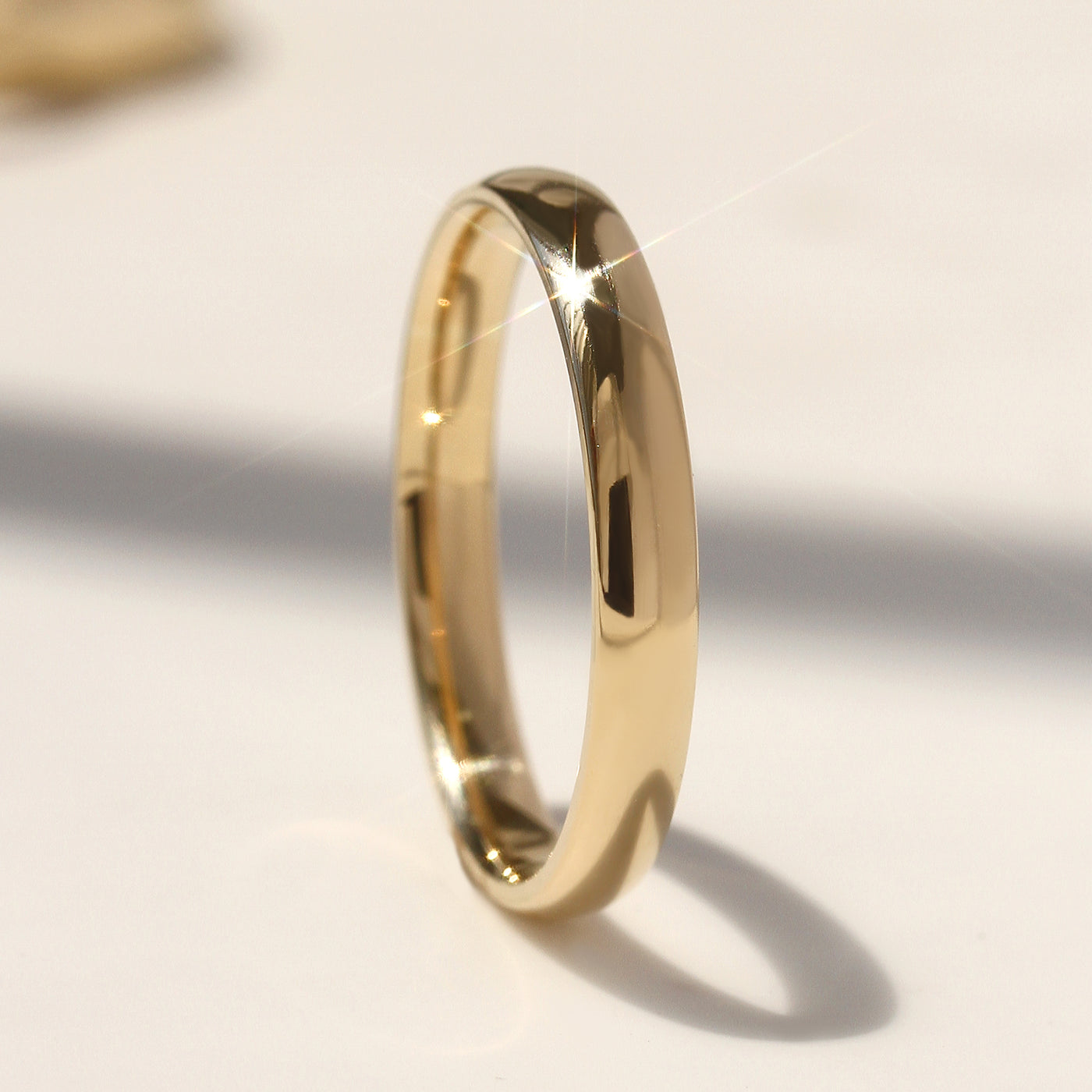 Solid 14K gold and Legacy Dome Band with high-polished finish, available in multiple widths.