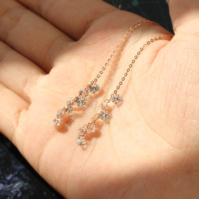 Solid 14K gold threader earrings with cascading CZ stones