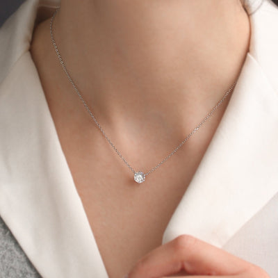 Aura Solitaire Necklace worn on neckline, showcasing minimal solitaire design.