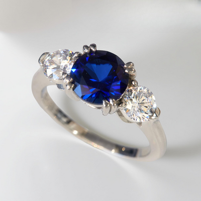 Sterling silver three stone promise ring with 2ct round blue spinel and cubic zirconia accents – Blue Breeze Promise Ring