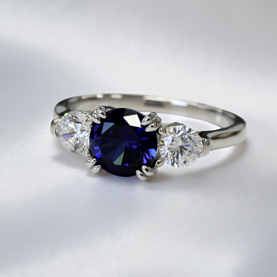 Sterling silver three stone promise ring with 2ct round blue spinel and cubic zirconia accents – Blue Breeze Promise Ring