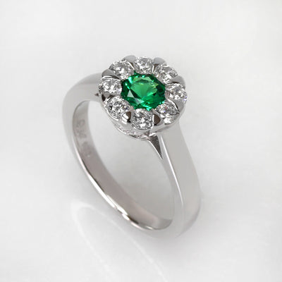 Serene Blossom: Emerald Promise Ring