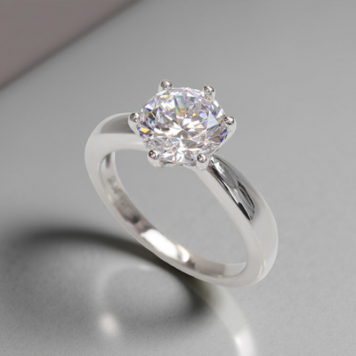 Side view of the Next Light Solitaire Ring – low-prong platinum setting with sparkling CZ