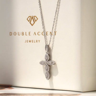 Silver cross pendant necklace on a Double Accent Jewelry box