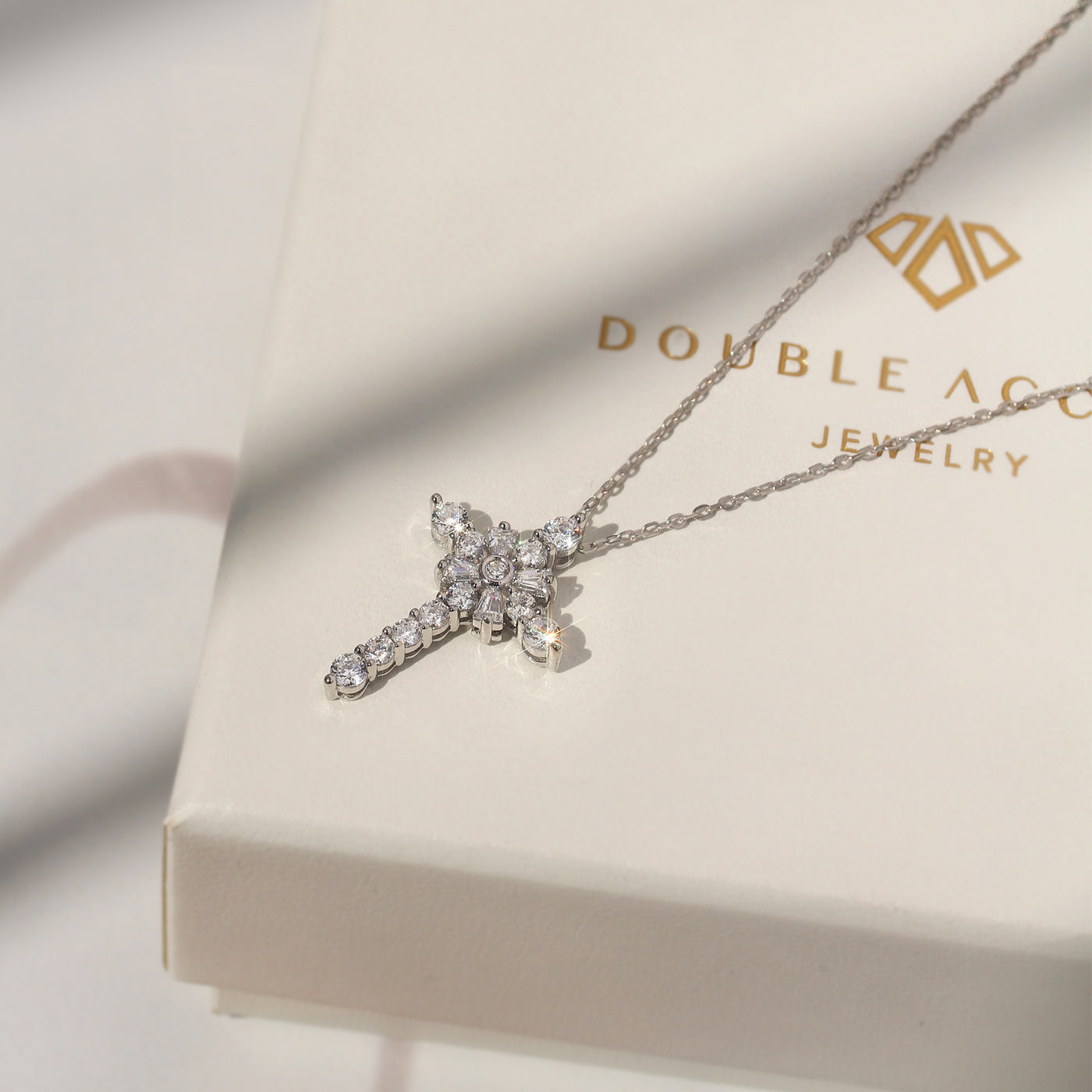 Baguette stone cross necklace in platinum-plated sterling silver – Radiant Grace Cross Necklace by DoubleAccent