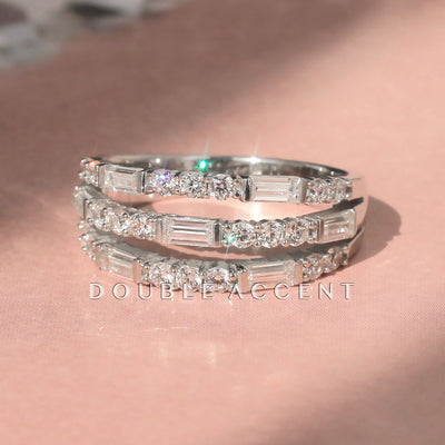 Platinum-plated sterling silver wide band ring with three rows of alternating round and emerald cut stones – Tender Triple Band