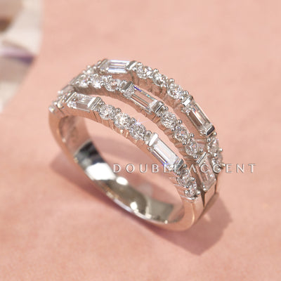 Platinum-plated sterling silver wide band ring with three rows of alternating round and emerald cut stones – Tender Triple Band