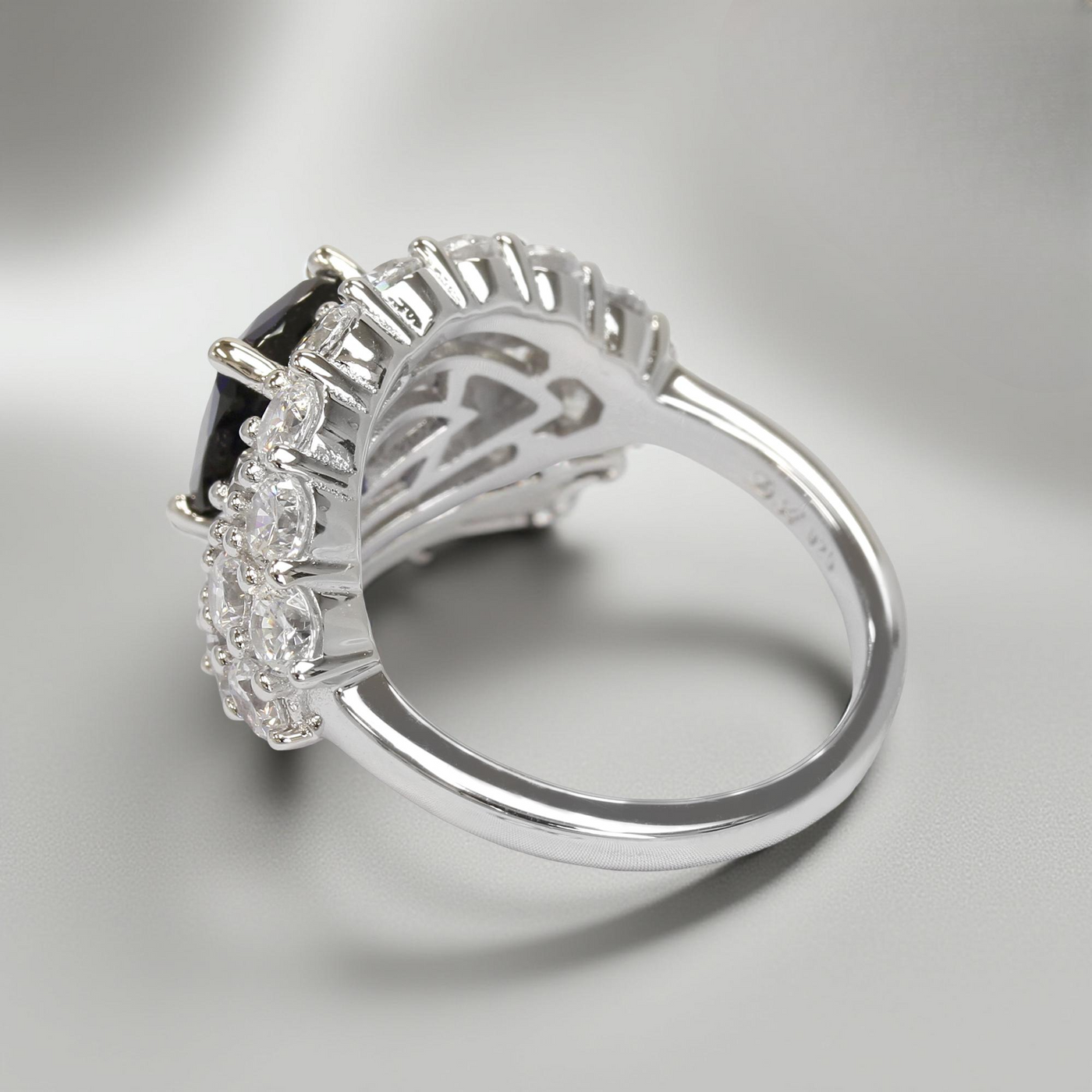 Platinum-plated sterling silver statement ring with 2.6ct cushion-cut blue spinel and cubic zirconia halo – Blue Majesty Cushion Ring