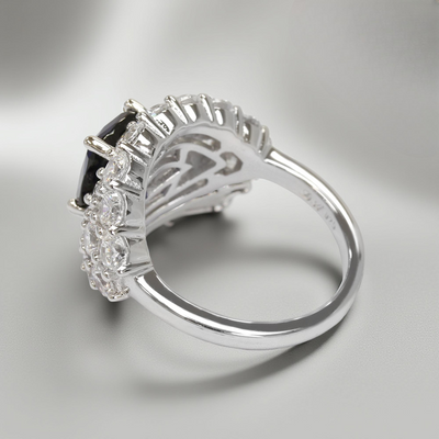 Platinum-plated sterling silver statement ring with 2.6ct cushion-cut blue spinel and cubic zirconia halo – Blue Majesty Cushion Ring