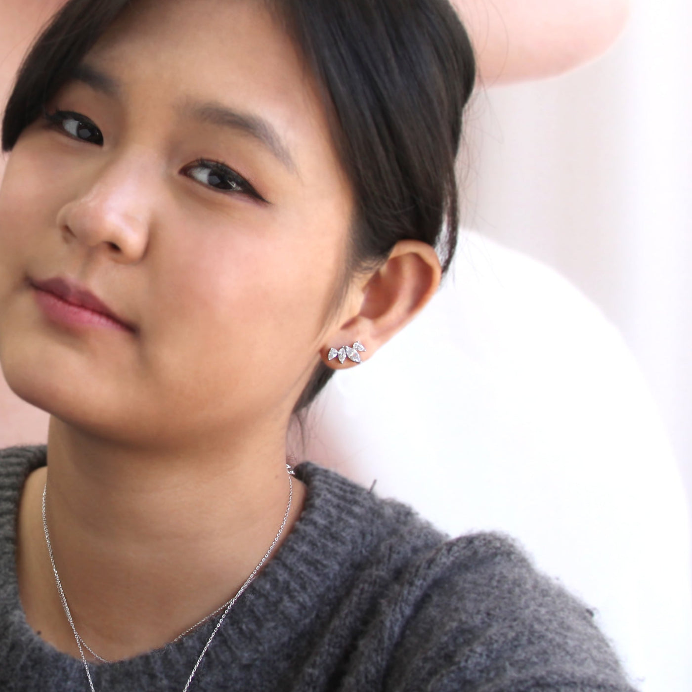 Model wearing the full Still Blooming Lily earrings — elegant and healing vibe