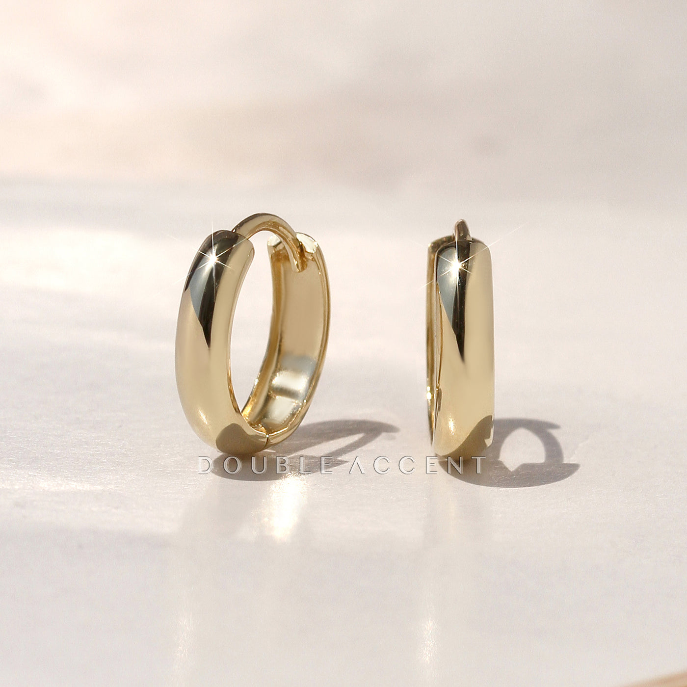 Classic Dome Huggie Earrings in solid 14K gold, available in small, medium, and large sizes – Double Accent