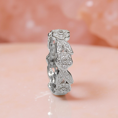 Bloom Bond Eternity Ring in rhodium-plated silver with pavé CZ, vintage curve.