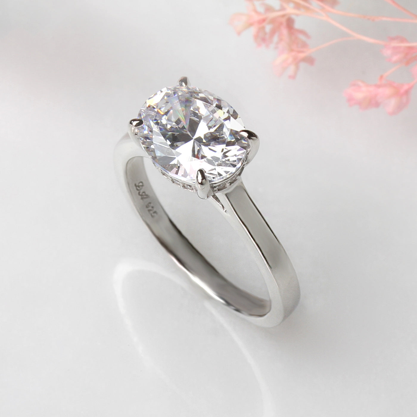 Oval Embrace Hidden Halo Ring