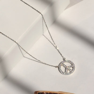 Zenith Peace Pendant Necklace with cubic zirconia pave peace sign in rhodium-plated sterling silver