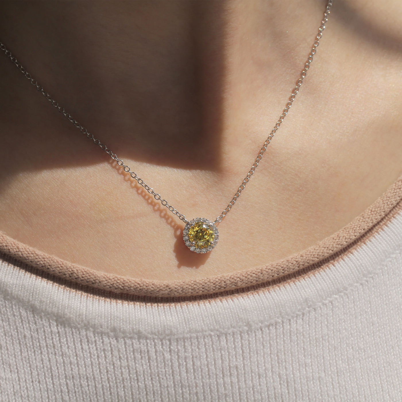Gratitude Halo Necklace — sterling silver halo pendant with 1.2 carat CZ center, available in  yellow diamond tone