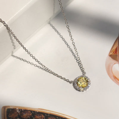 Gratitude Halo Necklace — sterling silver halo pendant with 1.2 carat CZ center, available in  yellow diamond tone