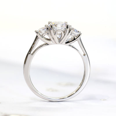 Rhodium-plated sterling silver three-stone ring with 1ct center cubic zirconia and two 0.25ct side stones — Trinity Grace Ring