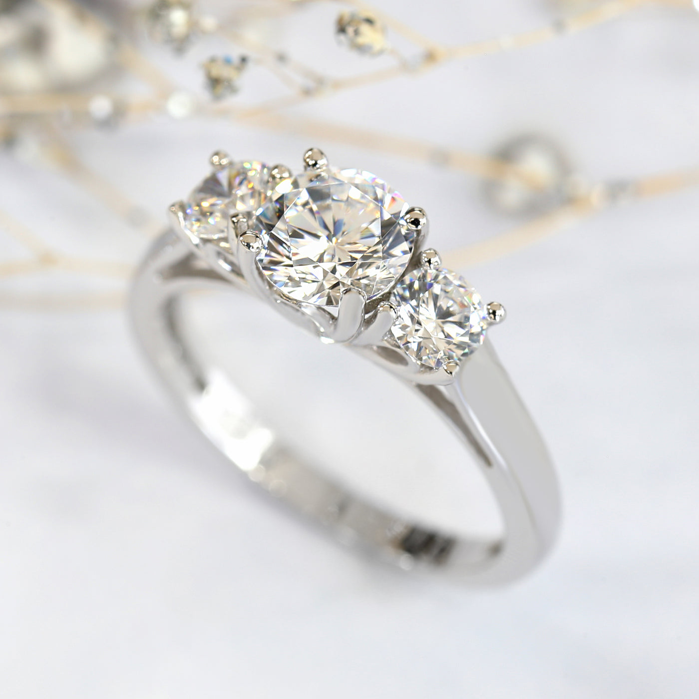 Rhodium-plated sterling silver three-stone ring with 1ct center cubic zirconia and two 0.25ct side stones — Trinity Grace Ring