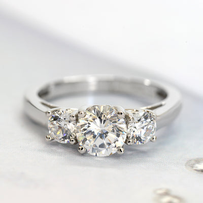Rhodium-plated sterling silver three-stone ring with 1ct center cubic zirconia and two 0.25ct side stones — Trinity Grace Ring