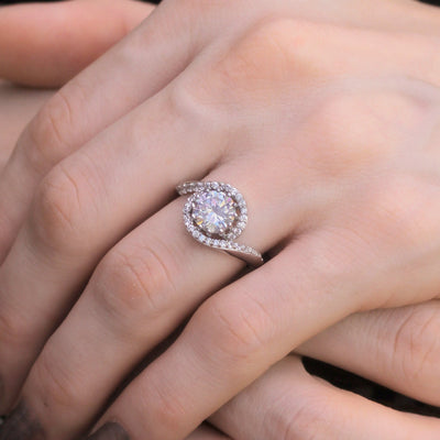 Hand wearing Seraphic Swirl Ring showing bypass design.