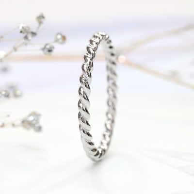 Thin 14K white gold twisted rope stackable ring close-up