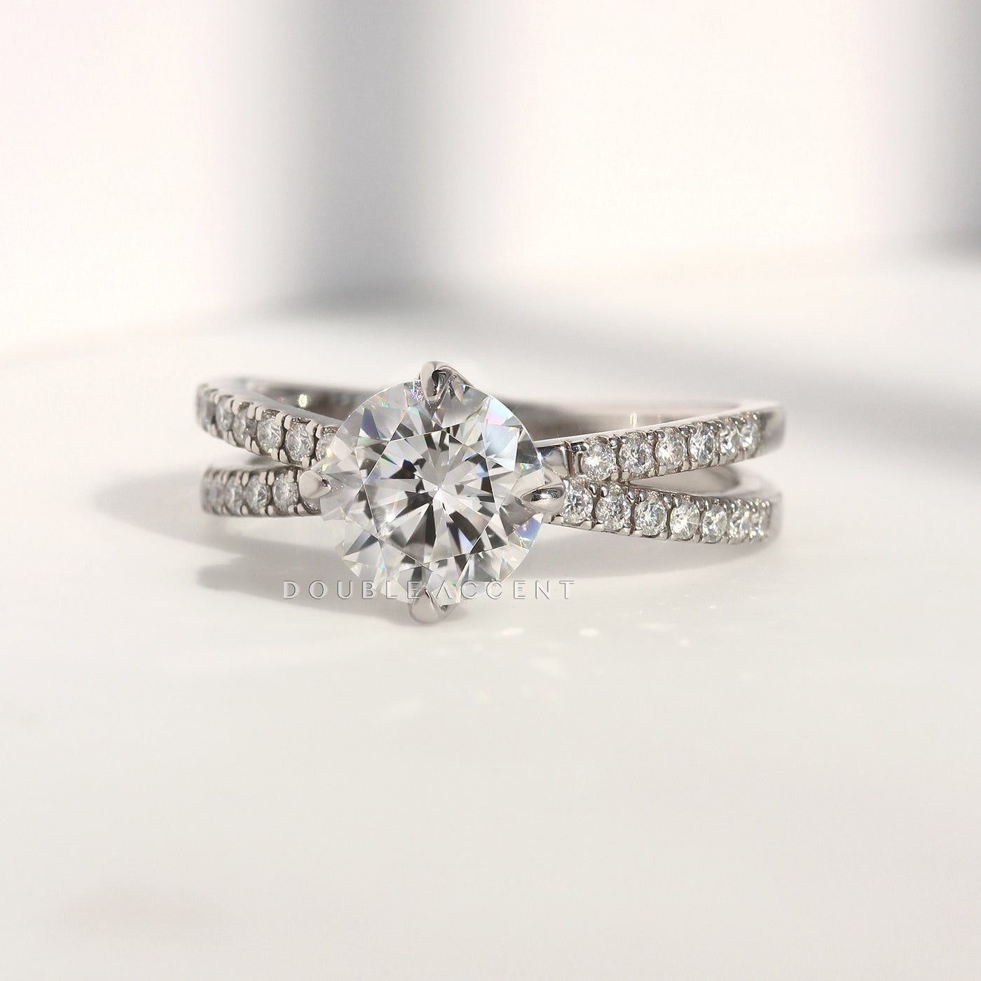 Side view – dual pavé rows and center stone setting