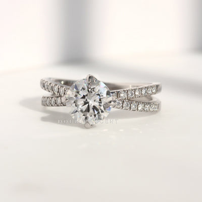 Side view – dual pavé rows and center stone setting