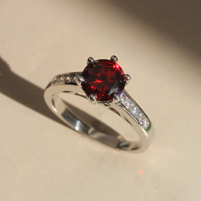 Scarlet Elegance: Garnet Engagement Ring